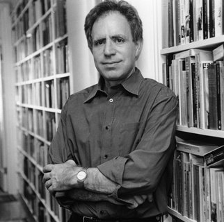 Photo of Edward Mendelson in front of bookshelf