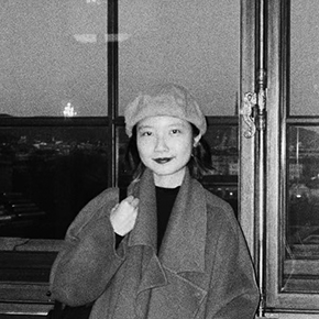 Yun Qin Wang