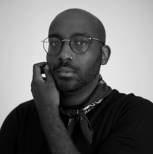travis l. tate